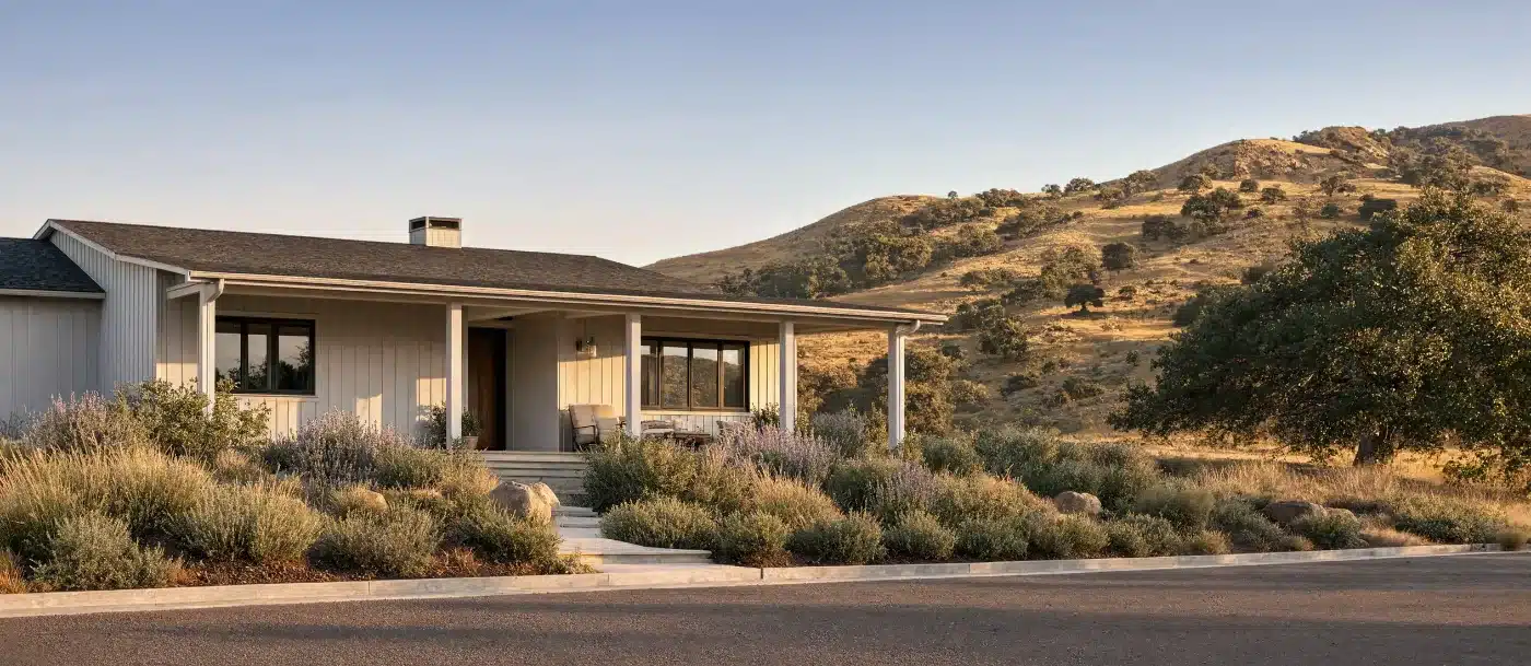 A single-story California house on a hillside street in the Pacific Palisades area